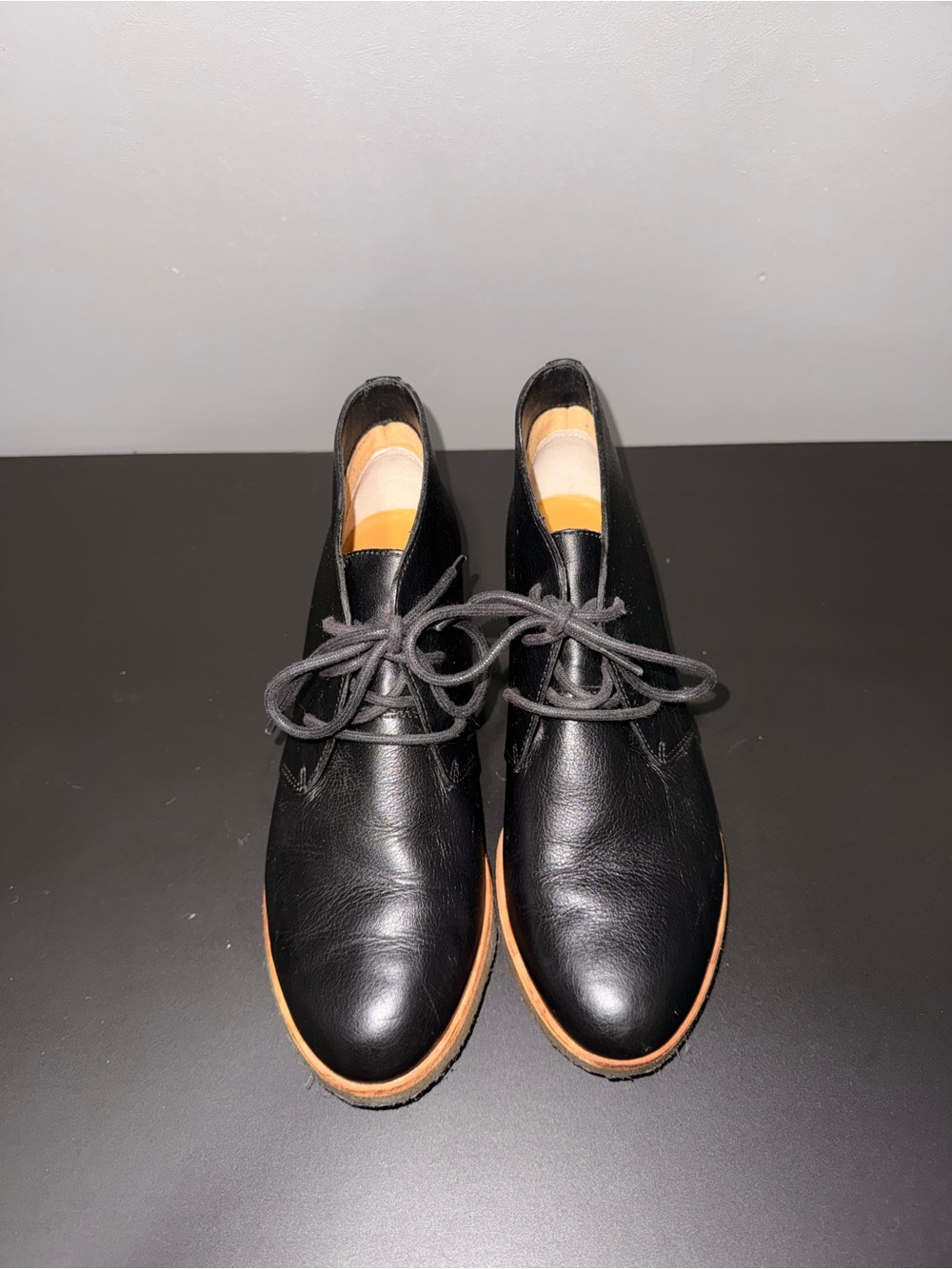 Clarks Black Leather Ankle Booties with Tan Sole